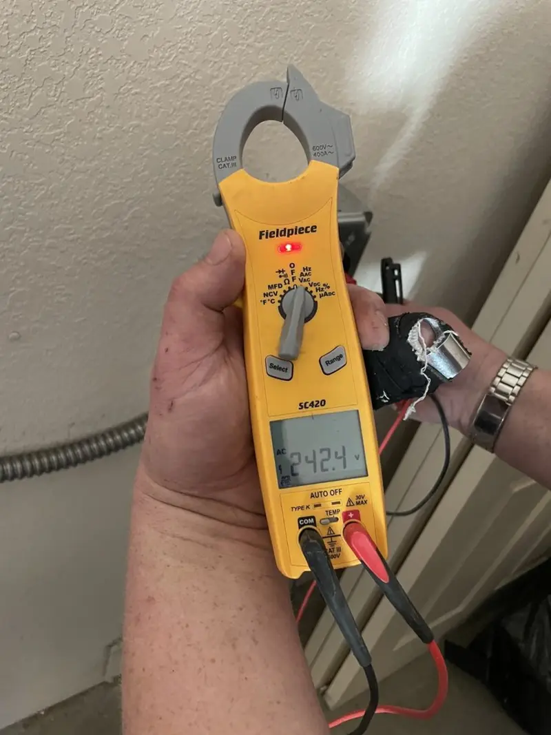 Voltage testing with clamp meter during Hot Tub / Pool Electrical Wiring in Naperville